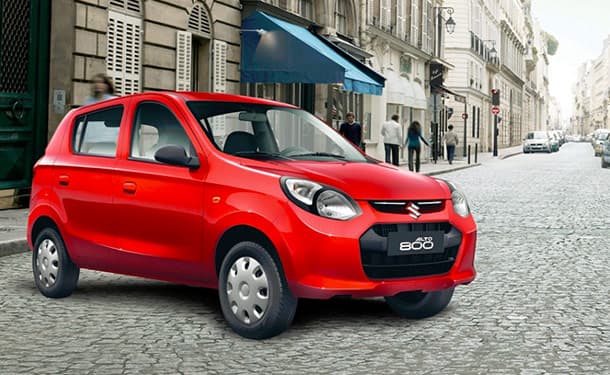 سياره-سوزوكي-حمراء-مباني-شارع